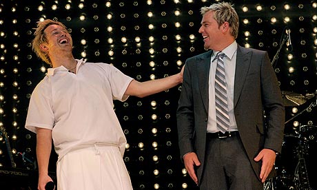 Shane Warne joins Eddy Perfect on stage for the opening night of Shane Warne The Musical