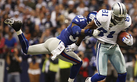 terrell owens. Terrell Owens tackled by Aaron