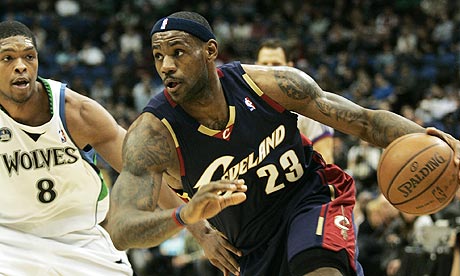 Cleveland Cavaliers forward LeBron James drives past Minnesota 39s Ryan Gomes