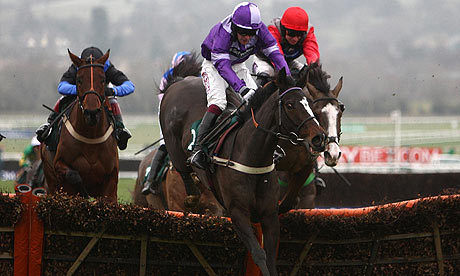 Awesome George, ridden by Charlie Huxley, clears the last on the way to victory at Cheltenham
