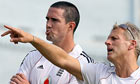 England cricket coach Peter Moores gestures as he talks with captain Kevin Pietersen