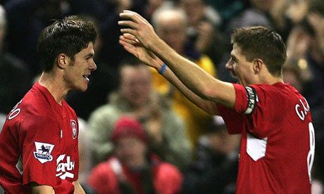 Xabi Alonso left and Steven Gerrard celebrate a goal in 2004