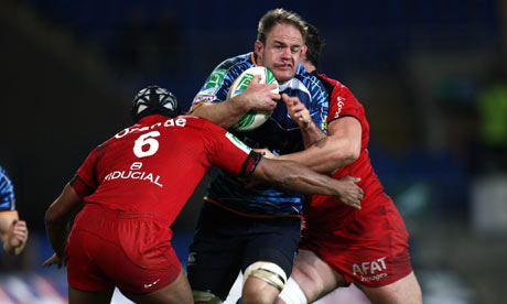 Cardiff Blues' Xavier Rush is tackled