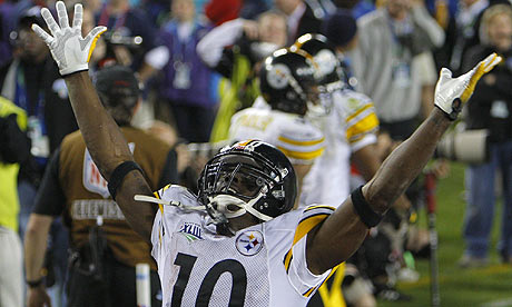 Steelers' Holmes celebrates after catching game-winning touchdown.