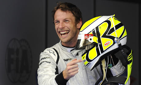 Jenson Button celebrates after taking pole position at the Malaysian Grand