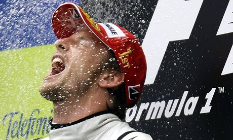 A soaked Jenson Button