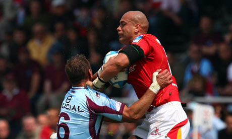Dale Rasmussen of Worcester is tackled during the game at Stade Pierre Rajon