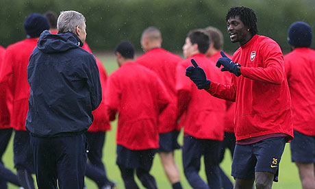 Arsene Wenger, left, and Emmanuel Adebayor