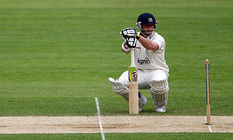Middlesex opener Phillip Hughes takes a quick breather at the Oval