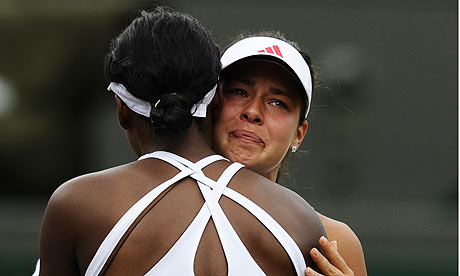 A tearful Ana Ivanovic embraces Venus Williams at Wimbledon after injury 