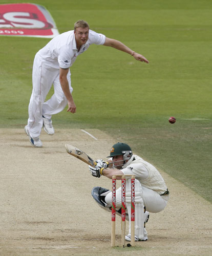Ashes second Test: Phillip Hughes ducks to avoid a delivery from Andrew Flintoff