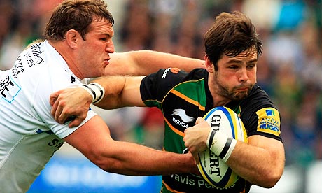 Northampton's Ben Foden, right, fends off Exeter's Brett Sturgess during their Premiership match