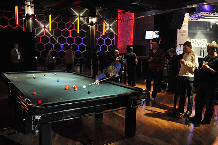 Power Snooker: Spectators watch the world champion Neil Robertson warming up 
