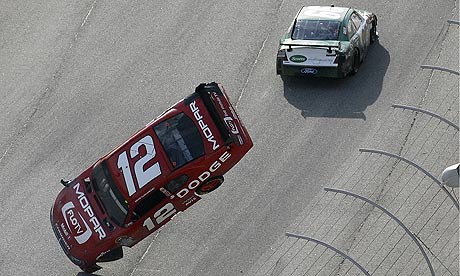Brad Keselowski flips after being nudged by Carl Edwards during the Nascar 