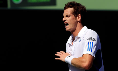 andy murray body. Andy Murray reacts to a poor shot during his unexpected defeat by Mardy Fish