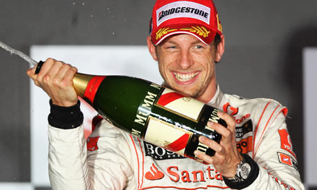 Jenson Button celebrates after winning his first grand prix for McLaren in