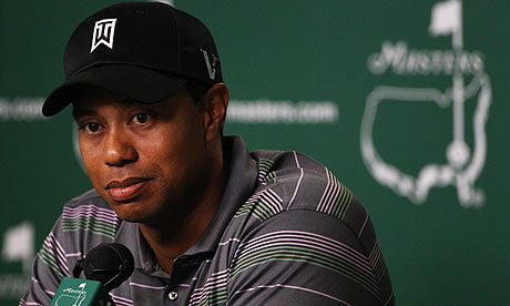 Tiger Woods speaks with the media after his four-under-par 68 during the first round of the Masters