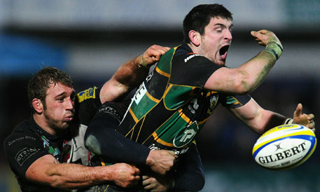 Chris Robshaw of Harlequins tackles James Downey of Northampton