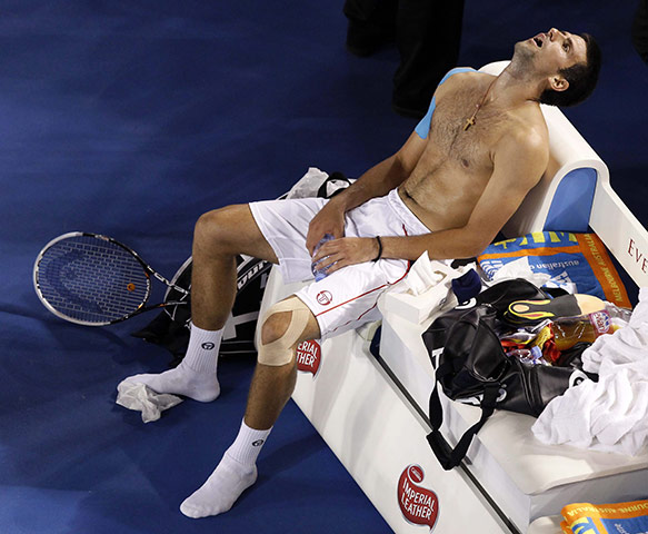 Australian Open final: After throwing his shirt and shoes into the crowd, Djokovic lets it sink in