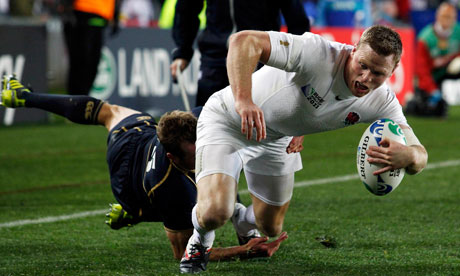England’s Chris Ashton crosses the line to score a try against Scotland