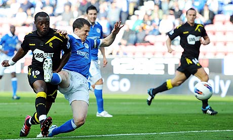 Nigel Reo-Coker of Bolton Wanderes scores his side's first goal at Wigan Athletic