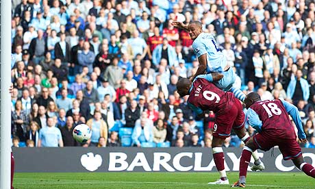 Manchester City's captain Vincent Kompany scores against Aston Villa