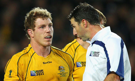 David Pocock of Australia speaks to the referee Craig Joubert