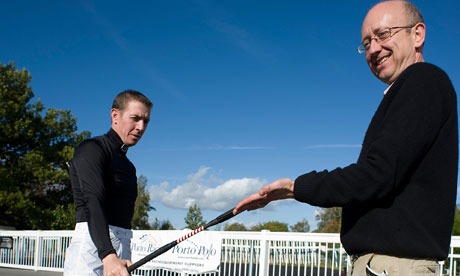 Jockey Jim Crowley whips Greg Wood at Lingfield.