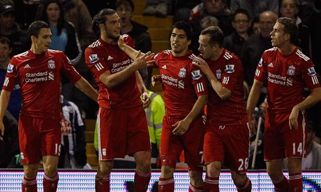 Downing, Carroll, Suárez, Adam and Henderson celebrating our second