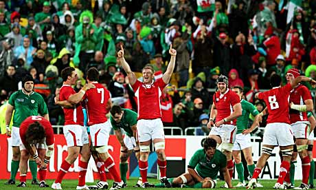 Wales celebrate their win at the final whistle 