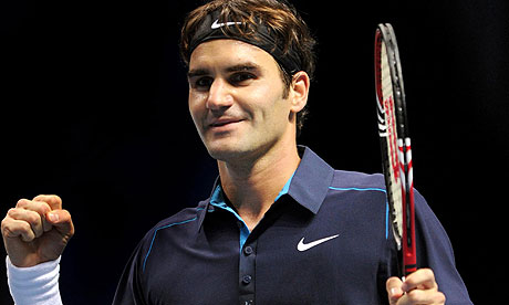 Roger Federer celebrates beating David Ferrer