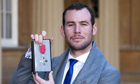 Cyclist Mark Cavendish collects MBE from Queen at Buckingham Palace
