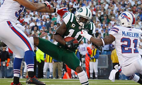 Santonio Holmes catches for a touchdown