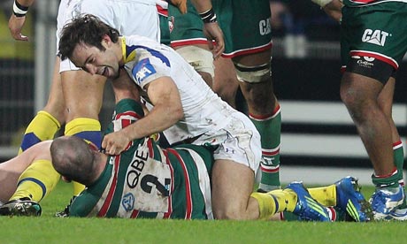 George Chuter, the Leicester hooker, tussels with Morgan Parra of Clermont Auvergne