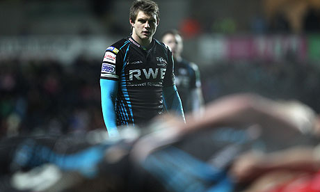 Dan Biggar of Ospreys looks on towards the scrum during the Heineken Cup defeat against Saracens