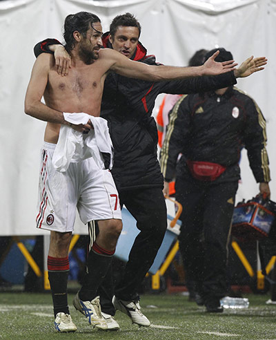 Milan v Spurs: Milan's Yepes and Oddo react at the end of the match against Tottenham
