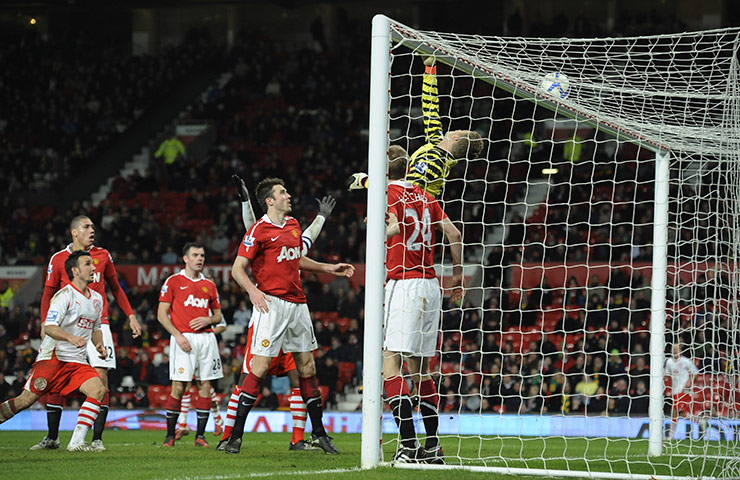 Man Utd v Crawley: Richard Brodie's header comes back of the United bar