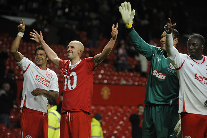 Man Utd v Crawley: Crawley players celebrate with the fans at the end