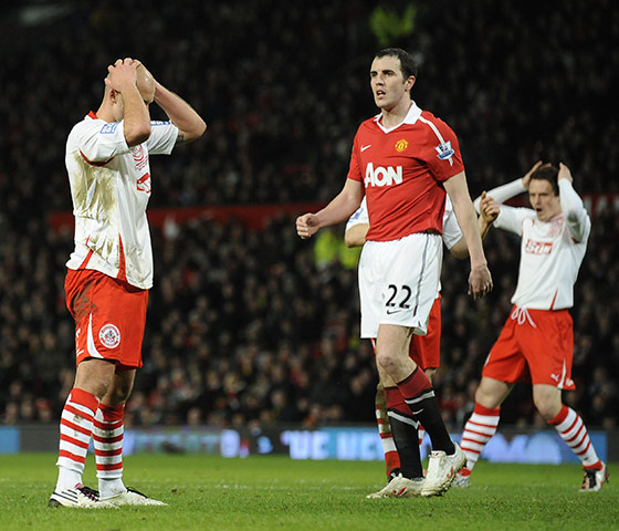 Man Utd v Crawley: A dejected David Hunt after he misses a chance to equalise