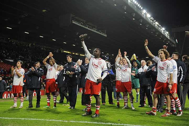 Man Utd v Crawley: Crawley players celebrate at the end 