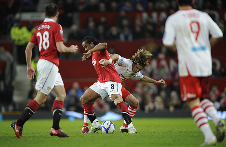 Man Utd v Crawley: Anderson and Sergio Torres tussle in the middle of the park