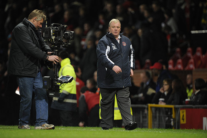 Man Utd v Crawley: Crawley boss Steve Evans has the camera on him as he walks off at half time