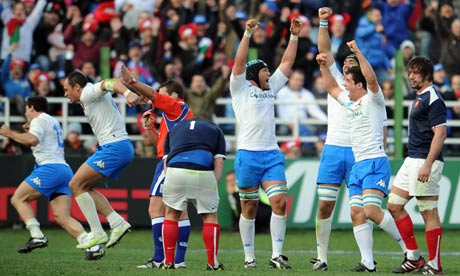Italy's players celebrate after defeatin