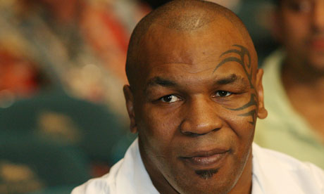 mike tyson in action. Mike Tyson has returned to our