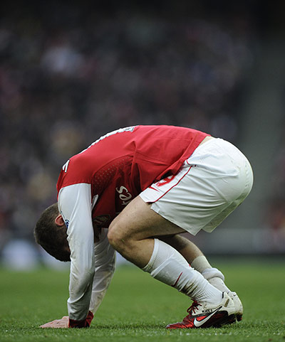 Arsenal v Sunderlan: Jack Wilshere gingerly rises to his feet after getting clattered