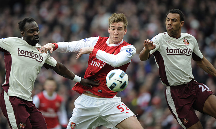 Arsenal v Sunderlan: Nicklas Bendtner gets between John Mensah and Anton Ferdinand