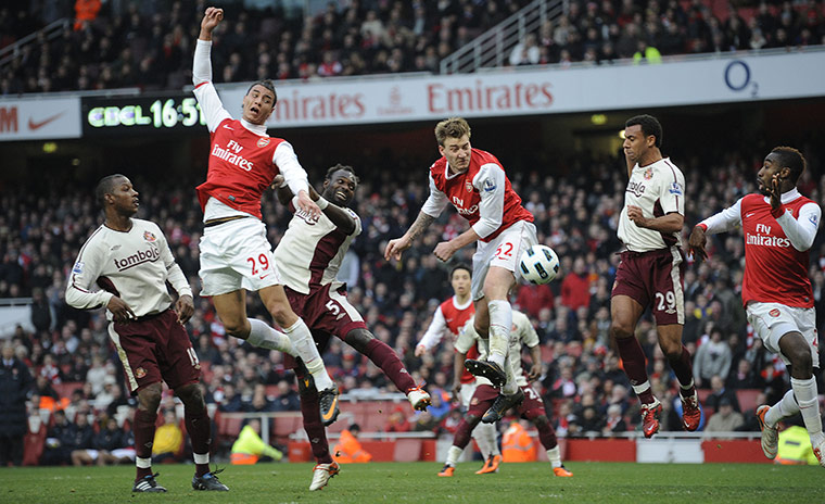 Arsenal v Sunderlan: Bendtner can only manage a weak header that's no problem for Mignolet