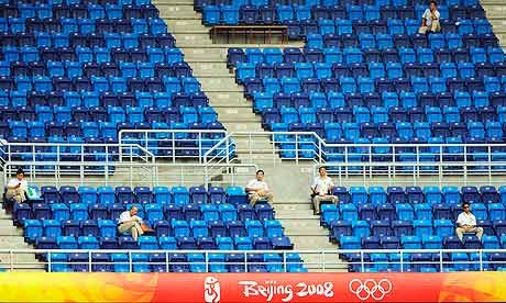 Empty seats at an Olympic football match in Tanjin