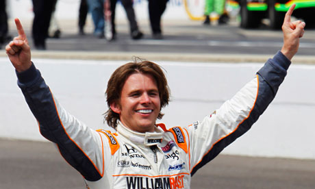 The IndyCar driver Dan Wheldon celebrates after winning his second Indy500