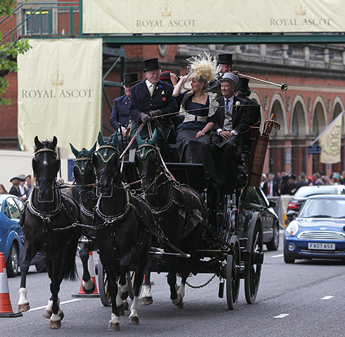 Royal Ascot day 2: Racegoers arrive at Royal Ascot in a horse-drawn carriage
